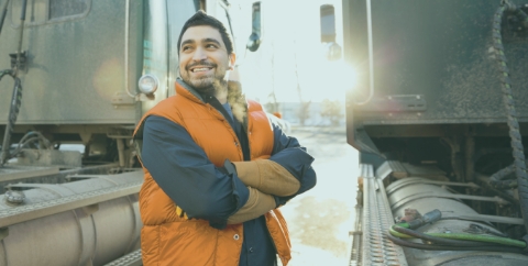 truck driver with arms crossed proudly
